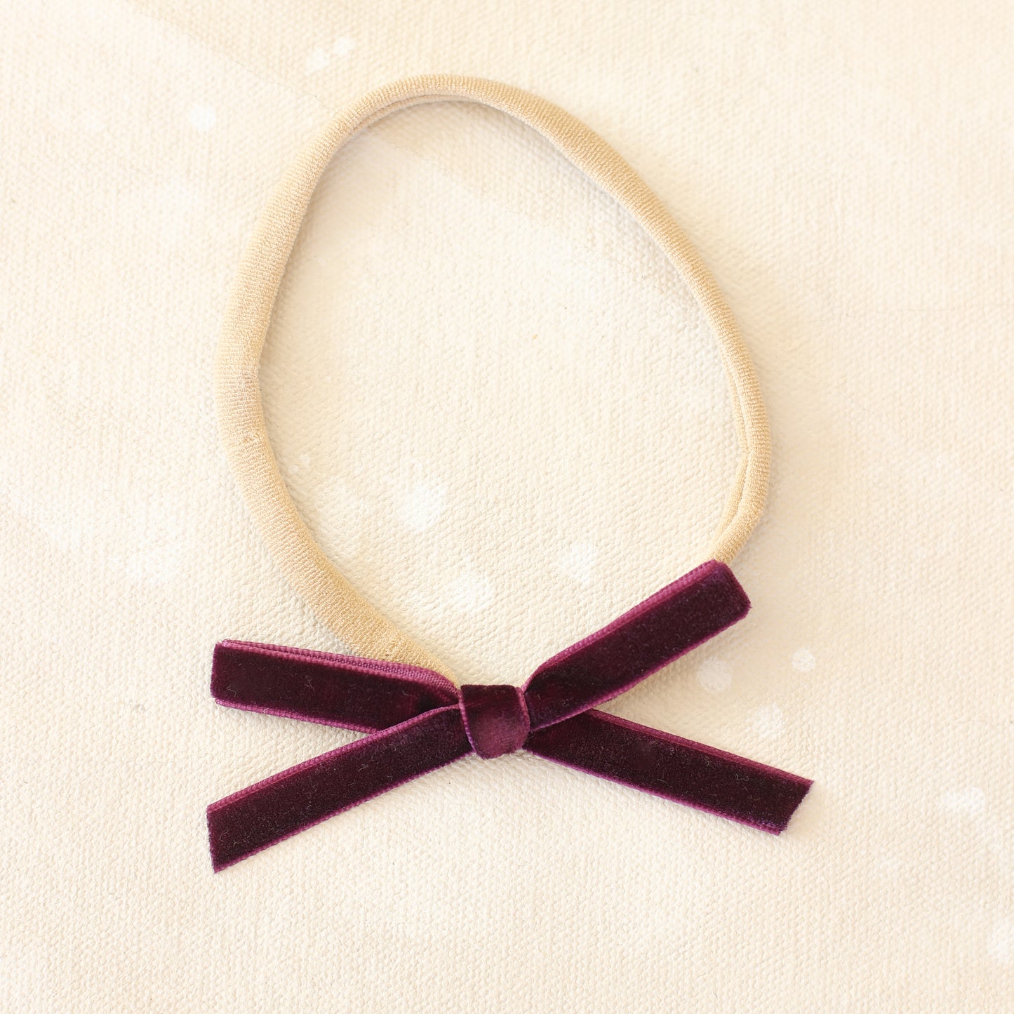 Velvet infant bow // Eggplant