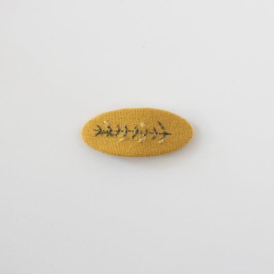 Embroidered snap clip // Mustard seed